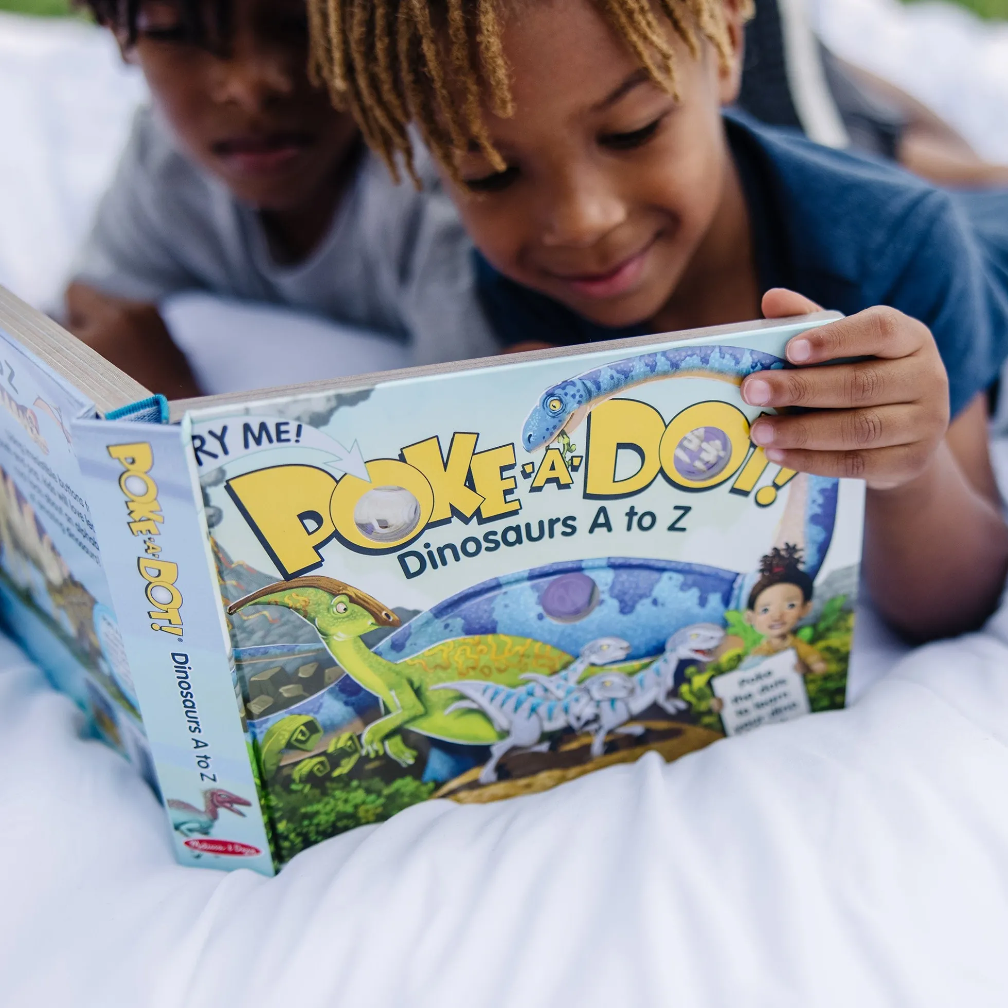Poke-a-Dot: Dinosaurs A to Z Board Book