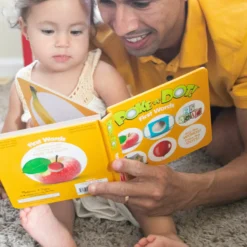 Poke-a-Dot: First Words Board Book