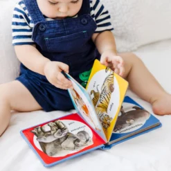 Poke-a-Dot: Wild Animal Families Board Book